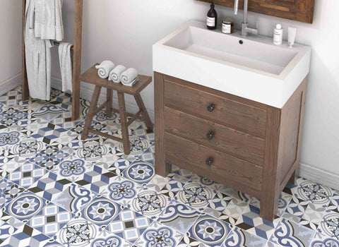 Matanzas Blue patterned tiles in the floor of bathroom